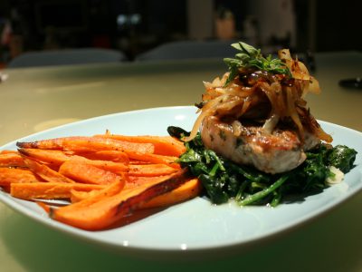 Kira Nam Greene Herb-encrusted Pork Chop with Spinach and Sweet Potato Oven Fries